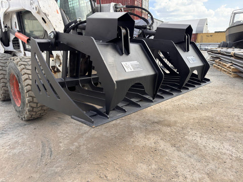 72" hydraulic grapple bucket on skid steer
Skid steer rock grapple front view
Close-up of grapple teeth and hoses
Dual-cylinder grapple open position
Grapple attachment lifting heavy debris