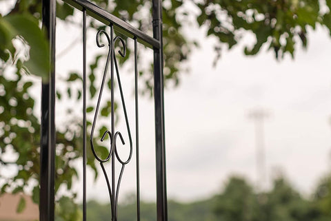 Black steel garden arbor arch in the outdoor lawn
Powder-coated metal trellis arch with decorative side panels
77-inch outdoor wedding arch for garden ceremonies
Steel arbor for roses and climbing vines
Decorative garden arch black steel frame assembled in the yard