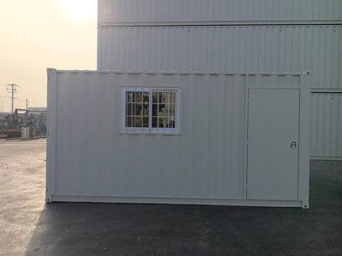 Gray 7FT steel office container with side door and windows
Interior view of 12FT jobsite office sea container
Office container unit with swing door and locking system
Plywood flooring inside portable office container
Security window with locking bar on steel sea container