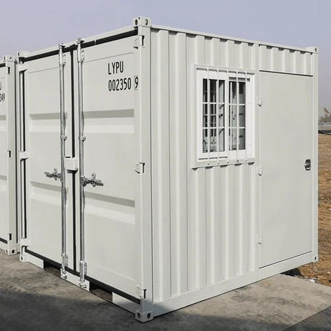 Gray 7FT steel office container with side door and windows
Interior view of 12FT jobsite office sea container
Office container unit with swing door and locking system
Plywood flooring inside portable office container
Security window with locking bar on steel sea container