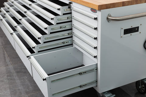 8FT Fatboy industrial tool bench with drawers and USB ports
Heavy-duty 24-drawer tool bench with stainless steel finish
Workshop organization tool bench with hardwood top
Mobile workbench with caster wheels and lockable drawers