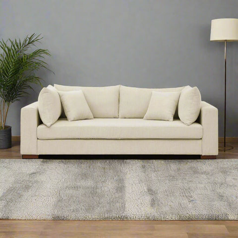 89.5” Square Arm Couch – Modern Living Room Setup
3-Seater Sofa with Toss Pillows – Front View
Upholstered Contemporary Sofa – Side Angle
Soft Plush Back Cushions – Detail Close-Up
Modern Beige Fabric Sofa – Apartment Living Room