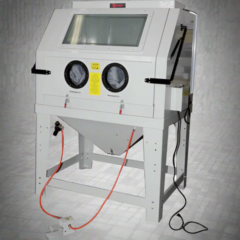 Industrial 990L sandblasting cabinet with blue and white finish, built-in dust collector, and fluorescent lighting