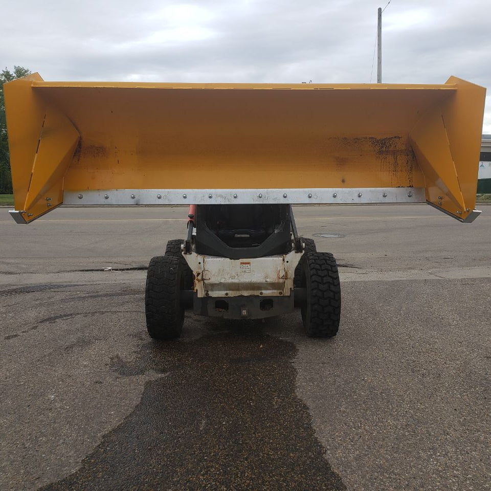 Bendall skid steer snow pusher attached to loader
Yellow snow box blade for skid steer
Heavy-duty snow bucket blade in winter setting
96-inch Bendall box blade in commercial snow use
Rear angle of Bendall snow blade showing mold board