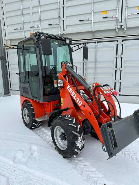 CanLift EREL10 electric wheel loader side view
Red electric wheel loader lifting materials
Bobcat-style quick hitch on CanLift loader
72V battery electric loader in warehouse
Heavy-duty compact loader with bucket attachment