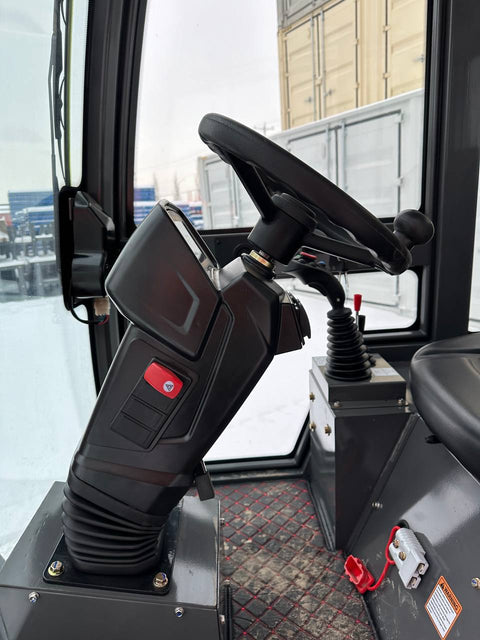 CanLift EREL10 electric wheel loader side view
Red electric wheel loader lifting materials
Bobcat-style quick hitch on CanLift loader
72V battery electric loader in warehouse
Heavy-duty compact loader with bucket attachment