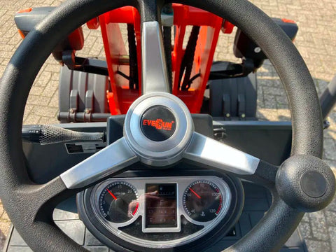 CanLift Mini Wheel Loader with Kubota D1703 engine
Orange and gray wheel loader with enclosed cabin
Compact loader with quick hitch and bucket
Mini loader for snow removal and landscaping
Hydrostatic drive mini loader with joystick control