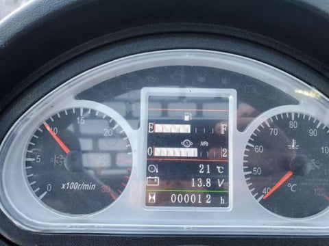 CanLift W12 Mini Wheel Loader with Kohler diesel engine outside a facility
Side view of CanLift W12 loader equipped with bucket attachment
Compact CanLift W12 Wheel Loader used on farm site