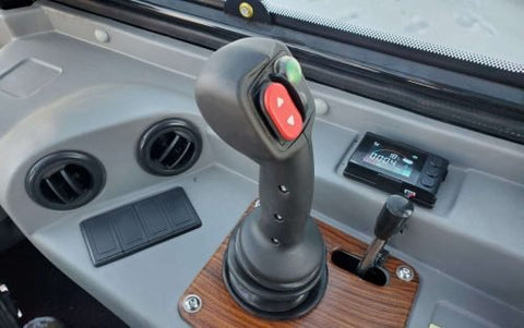 CanLift W12 Mini Wheel Loader with Kohler diesel engine outside a facility
Side view of CanLift W12 loader equipped with bucket attachment
Compact CanLift W12 Wheel Loader used on farm site