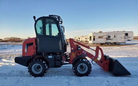 CanLift W12 Mini Wheel Loader with Kohler diesel engine outside a facility
Side view of CanLift W12 loader equipped with bucket attachment
Compact CanLift W12 Wheel Loader used on farm site