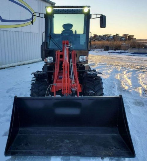 CanLift W12 Mini Wheel Loader with Kohler diesel engine outside a facility
Side view of CanLift W12 loader equipped with bucket attachment
Compact CanLift W12 Wheel Loader used on farm site