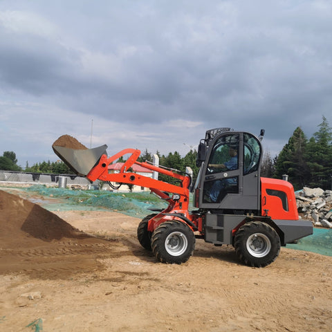 CanLift W12 Mini Wheel Loader with Kohler diesel engine outside a facility
Side view of CanLift W12 loader equipped with bucket attachment
Compact CanLift W12 Wheel Loader used on farm site