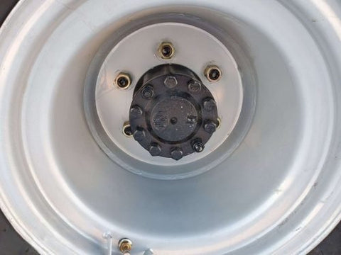 CanLift W12 Mini Wheel Loader with Kohler diesel engine outside a facility
Side view of CanLift W12 loader equipped with bucket attachment
Compact CanLift W12 Wheel Loader used on farm site