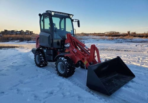 CanLift W12 Mini Wheel Loader with Kohler diesel engine outside a facility
Side view of CanLift W12 loader equipped with bucket attachment
Compact CanLift W12 Wheel Loader used on farm site