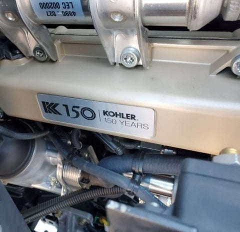 CanLift W12 Mini Wheel Loader with Kohler diesel engine outside a facility
Side view of CanLift W12 loader equipped with bucket attachment
Compact CanLift W12 Wheel Loader used on farm site