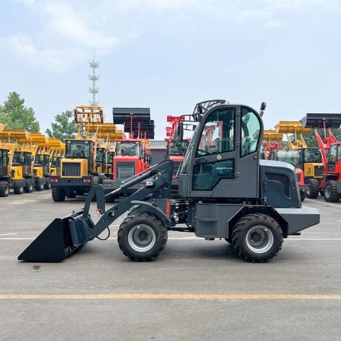 CanLift W12 Mini Wheel Loader with Kohler diesel engine outside a facility
Side view of CanLift W12 loader equipped with bucket attachment
Compact CanLift W12 Wheel Loader used on farm site