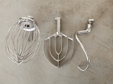 15 QT commercial dough mixer on stainless steel counter
Stainless steel mixing bowl with guard closed
Front view of food-grade commercial mixer with attachments
Dough hook installed on industrial kitchen mixer