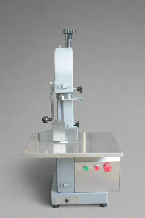 Main view of stainless steel meat and bone cutting saw machine
Compact commercial meat saw for kitchen or butcher use
Electric bone saw with sliding tray and safety guard
Replacement blade for commercial bone saw machine
Close-up of saw handle and stainless construction