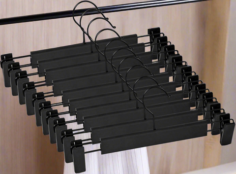 10-pack heavy-duty black clip hangers for pants and skirts
Non-slip vinyl clip steel hangers with swivel hooks
Durable trouser hangers space-saving design black color