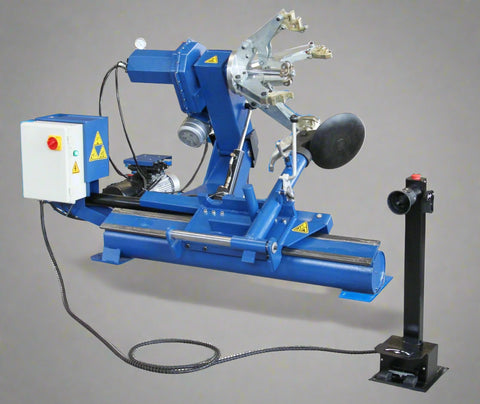 Heavy-duty electro-hydraulic truck tire changer – Model H8910 side view
H8910 tire changer with control console and hydraulic arm for trucks