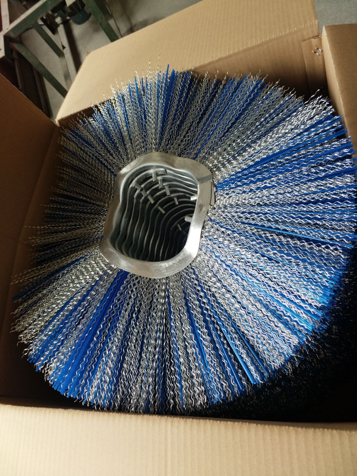 Heavy-duty wavy skid steer brush – top view
Blue poly bristles on Bobcat-compatible sweeper wafer
Wavy wafer sweeper brush 6.4 x 21.3 inches
Close-up of Bobcat skid steer sweeper brush construction