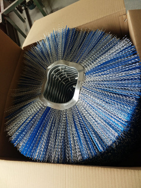 Heavy-duty wavy skid steer brush – top view
Blue poly bristles on Bobcat-compatible sweeper wafer
Wavy wafer sweeper brush 6.4 x 21.3 inches
Close-up of Bobcat skid steer sweeper brush construction