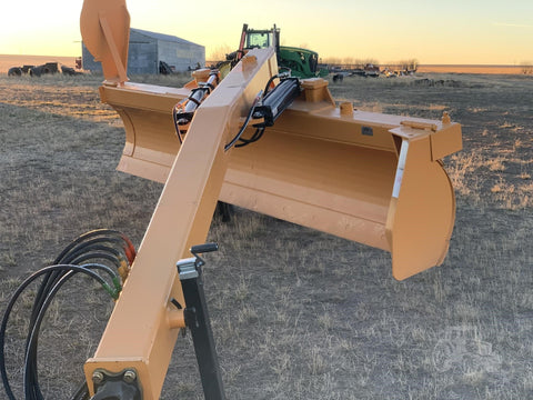 Industries America pull-type 12 FT grader scraper on gravel field
Heavy-duty 14 FT grader scraper with hydraulic control arms
16 FT grader scraper leveling rural construction site
Side view of orange pull-type grader scraper for tractors
Durable steel blade grader scraper with triple reinforced frame