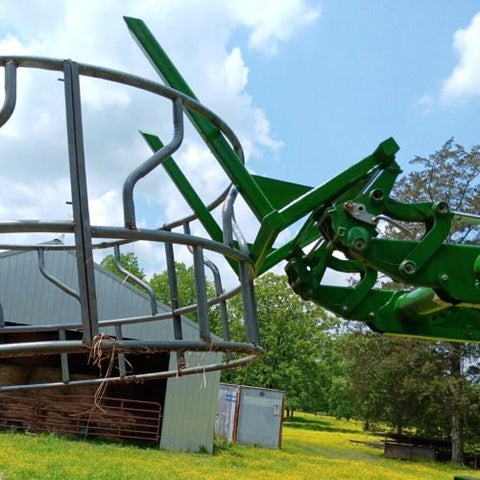 John Deere Euro/Global weld-on plate LYM0070 – front view
Weld-on adapter plate on fabrication bench
John Deere attachment with Euro style weld-on quick plate
Close-up of precision cut steel plate edges