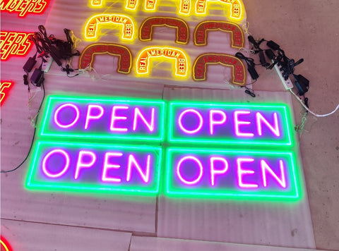 “Jumbo neon LED open sign hanging in storefront window”
“Close-up of waterproof bright open sign for business”
“High visibility LED open sign with pink and green lighting”