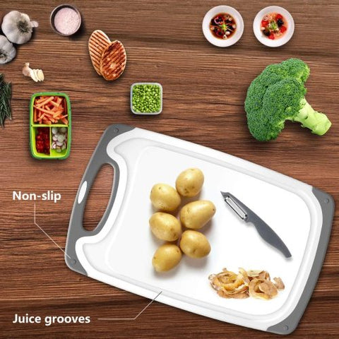 Plastic kitchen cutting boards with anti-slip handles and bonus knife
4-piece BPA-free cutting board set with juice grooves
Non-slip cutting board set in various sizes with stainless steel knife
Easy-grip chopping board set for meat, veggies, and fruits