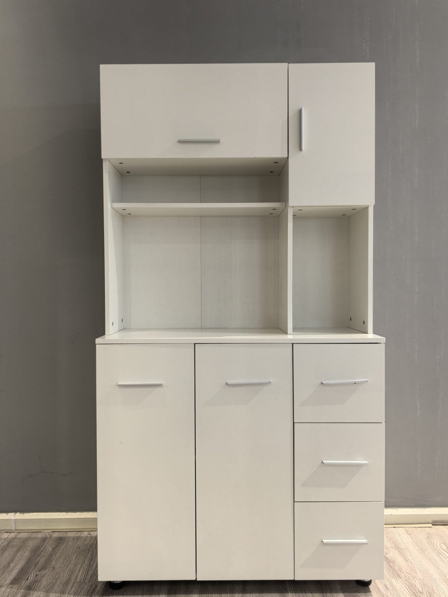 "Freestanding white wood kitchen pantry cabinet with adjustable shelves, drawers, and doors – Model 113221"