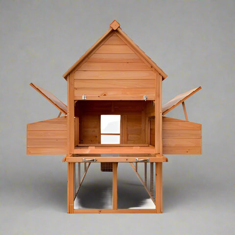 Large wooden backyard chicken coop with galvanized roof, nesting box, and walk-in run