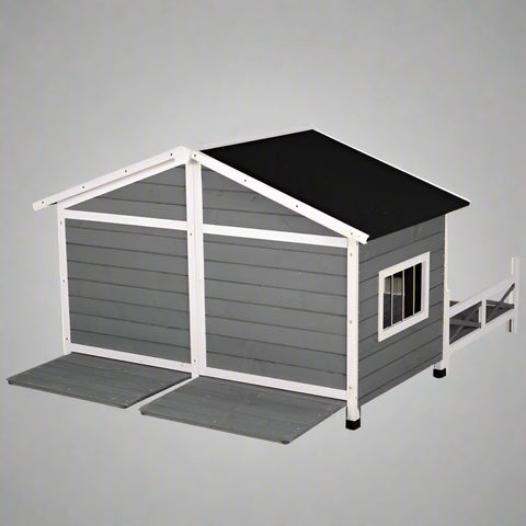 Large wooden raised outdoor dog house with porch – cabin-style weatherproof pet shelter