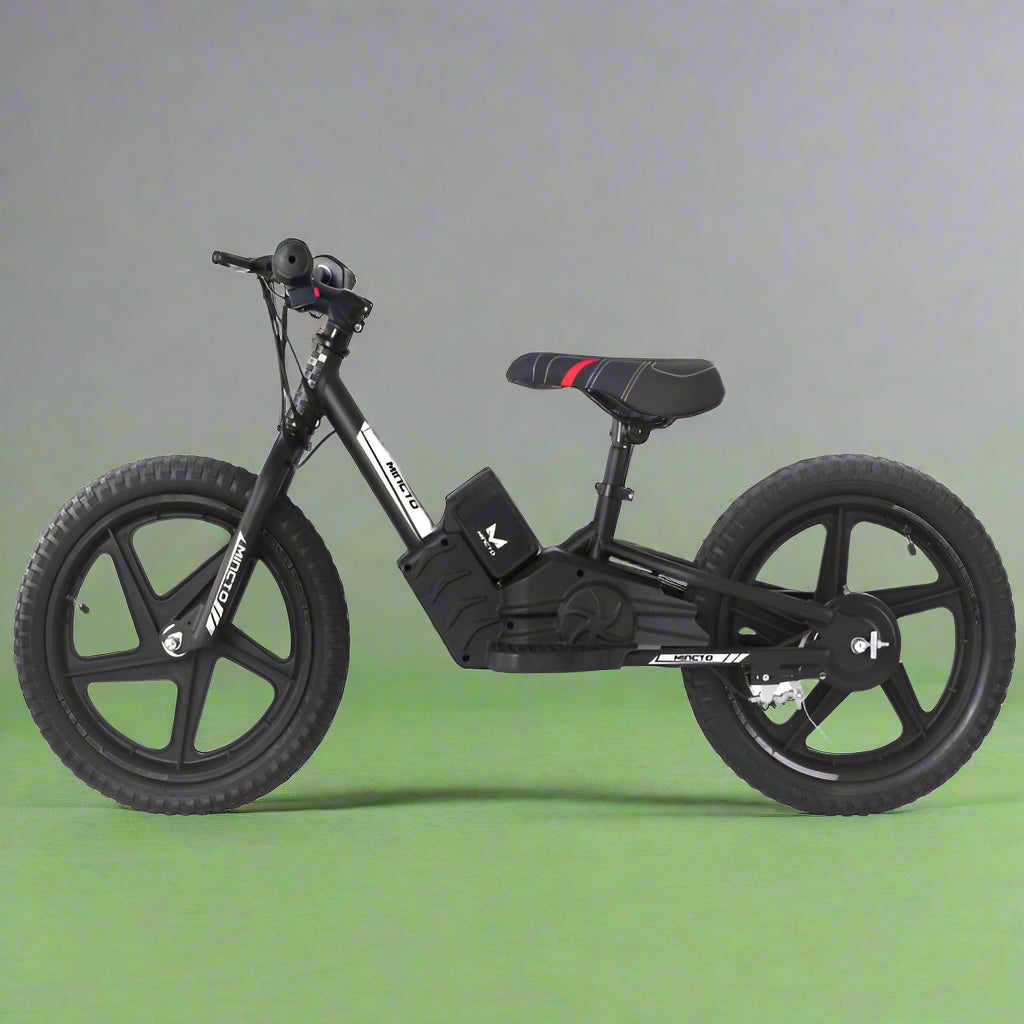 Kids 16" black electric balance bike with training wheels
Side view of 12" black lithium e-bike for children