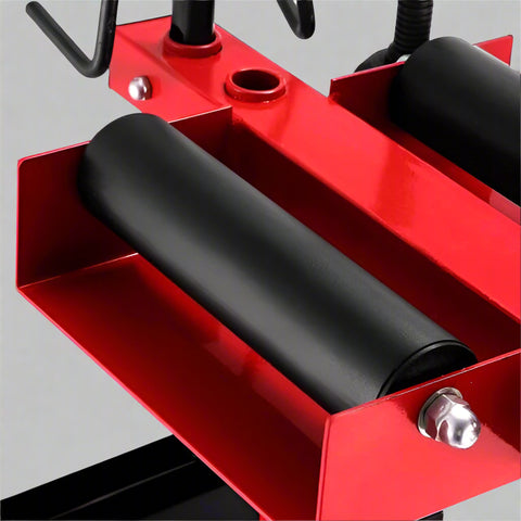 Manual tire changer and spreader stand with red base and swivel platform
Tire changer stand showing adjustable tilt function and tool tray
Manual tire repair stand for light truck tires in auto repair garage