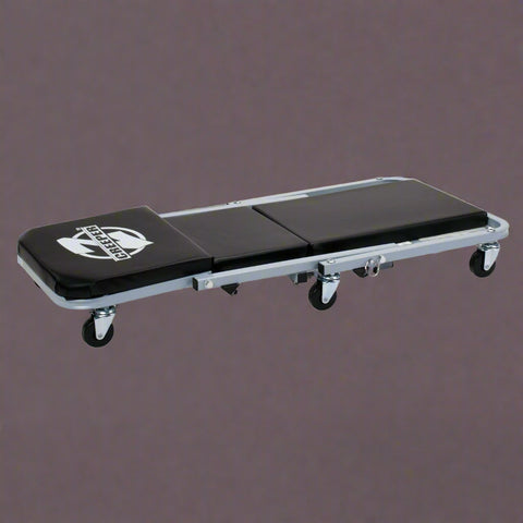 Mechanics creeper rolling cart with padded vinyl surface
Convertible garage seat and creeper with 6 caster wheels
Black auto repair creeper with metal frame and seat
S1066 rolling creeper seat in upright position for repairs