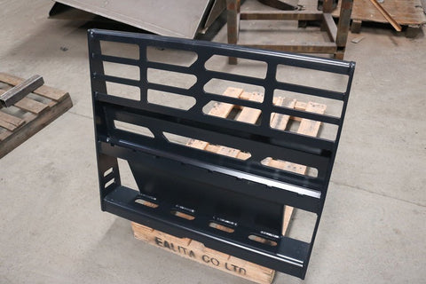 Mini skid steer pallet fork attachment with 2205 lb lift capacity
Heavy-duty pallet forks for Dingo-style mini loaders
Black steel frame and tines for mini skid steer forklift attachment
Compact pallet fork attachment mounted on mini track loader