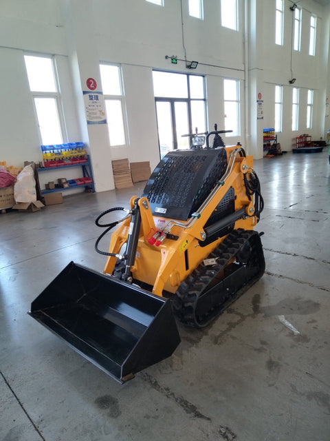 “T380 compact skid steer loader with rubber tracks”
“T460 mini tracked loader for landscaping and excavation”
“Heavy-duty skid steer with universal quick attach plate”
“Tracked compact construction loader in yellow”