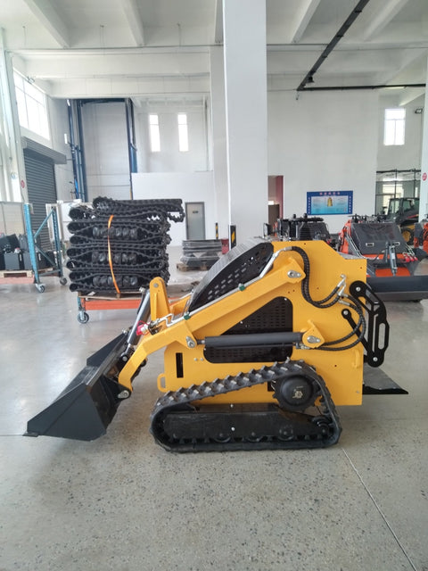 “T380 compact skid steer loader with rubber tracks”
“T460 mini tracked loader for landscaping and excavation”
“Heavy-duty skid steer with universal quick attach plate”
“Tracked compact construction loader in yellow”