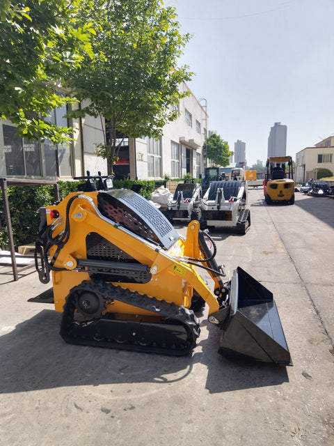 “T380 compact skid steer loader with rubber tracks”
“T460 mini tracked loader for landscaping and excavation”
“Heavy-duty skid steer with universal quick attach plate”
“Tracked compact construction loader in yellow”