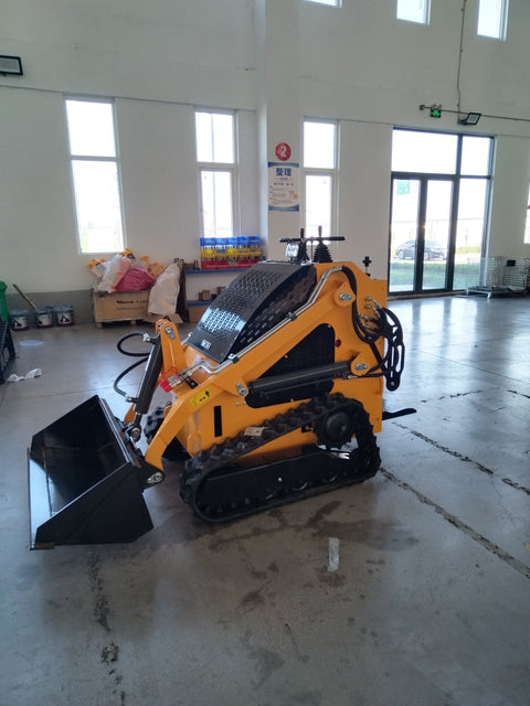 “T380 compact skid steer loader with rubber tracks”
“T460 mini tracked loader for landscaping and excavation”
“Heavy-duty skid steer with universal quick attach plate”
“Tracked compact construction loader in yellow”