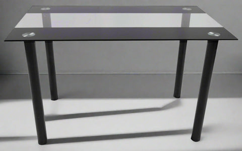 Close-up of black tempered glass tabletop with chrome legs