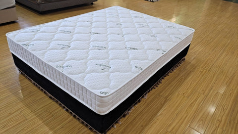 Night Star Pocket Coil Mattress - front angle view
Breathable edge mattress with medium firm feel
Close-up of quilted linen fabric mattress top
Innerspring mattress side profile on wood floor
Rolled mattress for delivery and setup
