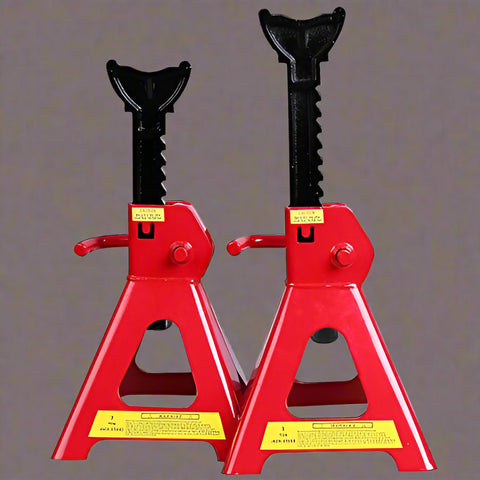 “Pair of red heavy-duty jack stands on concrete garage floor”
“6-ton jack stands with ratchet and locking pin”
“12-ton jack stands supporting heavy-duty pickup truck”