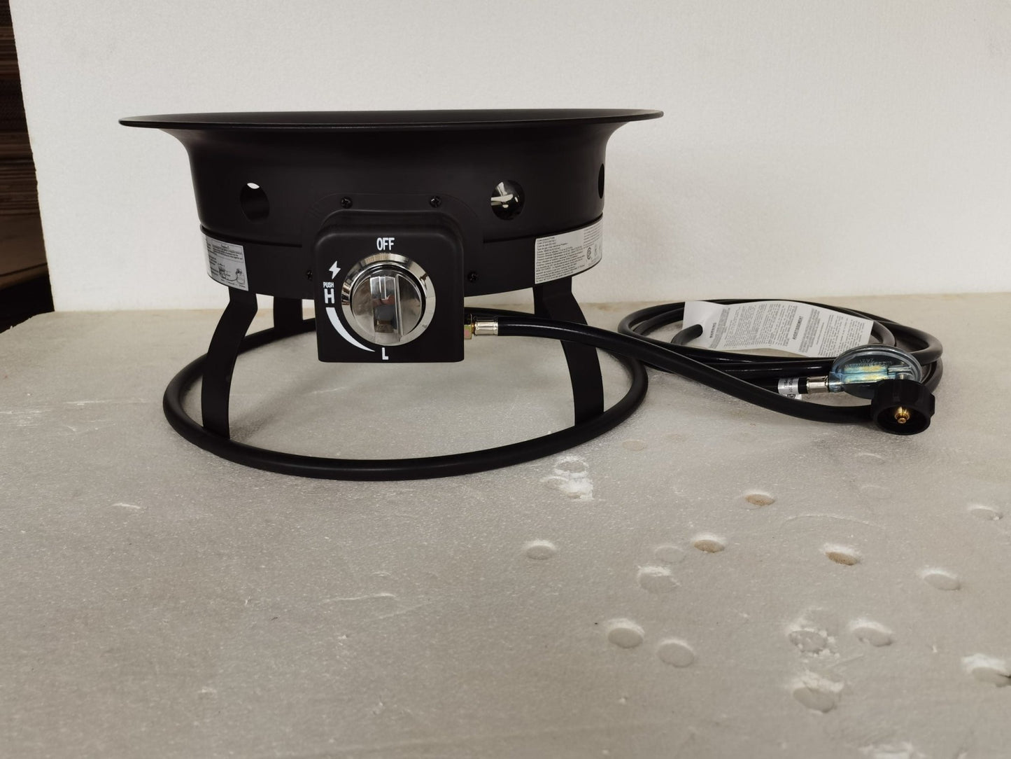 52,000 BTU propane fire pit with lava rocks burning
portable camping fire pit with BBQ grill top
outdoor propane fire pit kit with hose and stand
black fire pit for patio and tailgate cooking
propane gas fire pit with included lava rocks