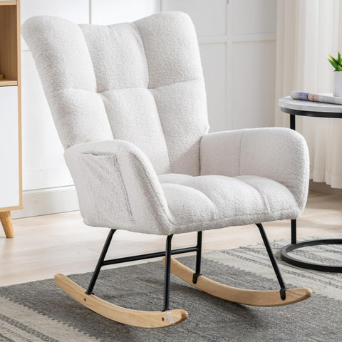 Gray ergonomic glider rocking chair for nursery with wood base
White soft upholstered rocking chair with curved wood base
Rocking chair for the living room with ergonomic support and plush padding