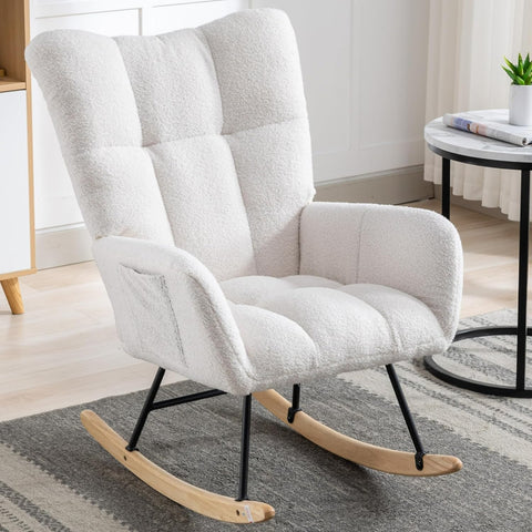 Gray ergonomic glider rocking chair for nursery with wood base
White soft upholstered rocking chair with curved wood base
Rocking chair for the living room with ergonomic support and plush padding