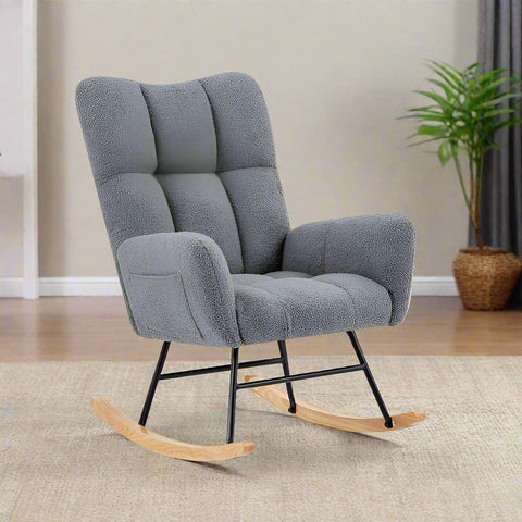 Gray ergonomic glider rocking chair for nursery with wood base
White soft upholstered rocking chair with curved wood base
Rocking chair for the living room with ergonomic support and plush padding