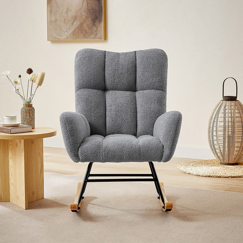 Gray ergonomic glider rocking chair for nursery with wood base
White soft upholstered rocking chair with curved wood base
Rocking chair for the living room with ergonomic support and plush padding