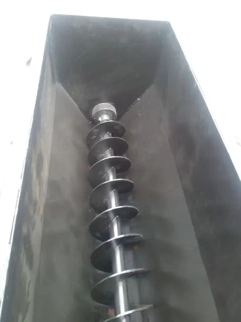 Side dumping concrete mixer bucket with auger for skid steer
Rear view of mixer bucket showing hydraulic motor
Top-down view of internal auger system
Mounted auger mixer on skid steer in use
Side discharge concrete auger bucket on loader